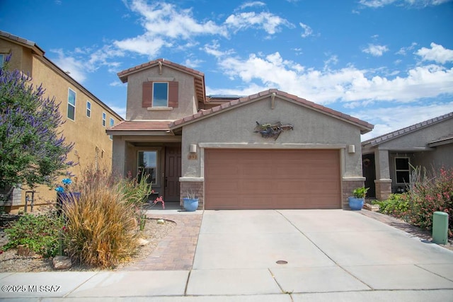 893 E Bottomlands Ln, Sahuarita, AZ 85629 - view of front facade featuring stucco siding, a tiled roof, an attached garage, and concrete driveway