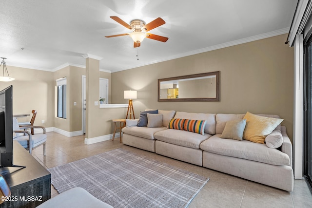 5751 N Kolb Rd Unit 23104, Tucson, AZ 85750 - living area with tile patterned flooring, ceiling fan, crown molding, and baseboards