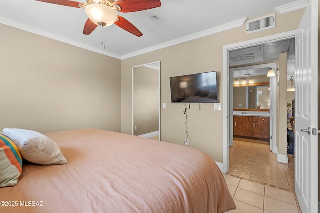 5751 N Kolb Rd Unit 23104, Tucson, AZ 85750 - bedroom featuring crown molding, light tile patterned flooring, baseboards, and a ceiling fan