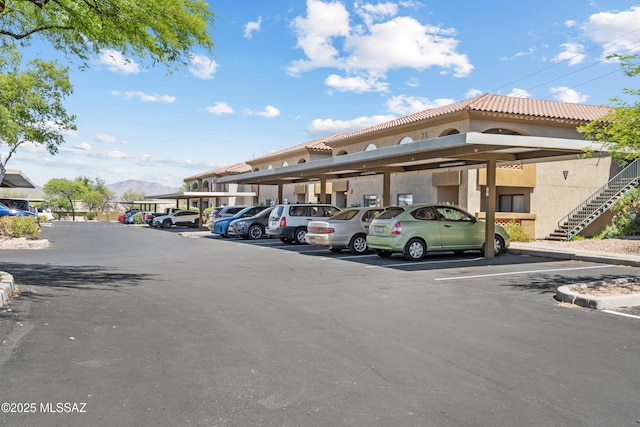 5751 N Kolb Rd Unit 23104, Tucson, AZ 85750 - partially covered parking lot with a mountain view and stairway