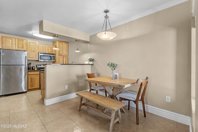 5751 N Kolb Rd Unit 23104, Tucson, AZ 85750 - dining area with ornamental molding, baseboards, and light tile patterned flooring