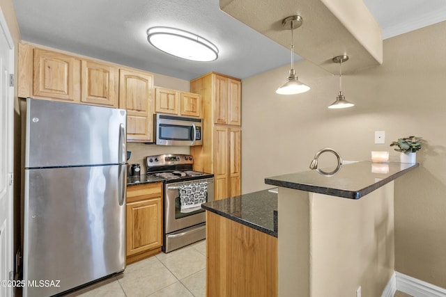 5751 N Kolb Rd Unit 23104, Tucson, AZ 85750 - kitchen with stainless steel appliances, a peninsula, decorative light fixtures, light tile patterned floors, and light brown cabinetry