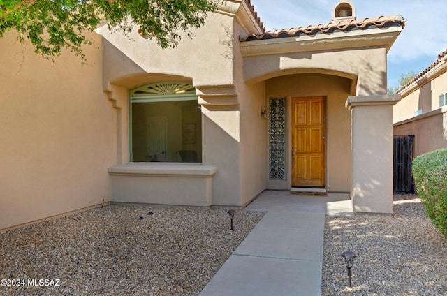 6321 N Via Lomas De Paloma, Tucson, AZ 85718 - doorway to property with stucco siding