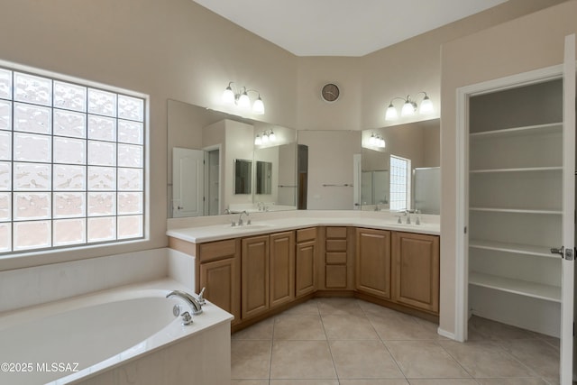 6321 N Via Lomas De Paloma, Tucson, AZ 85718 - bathroom with double vanity, tile patterned floors, and a bath