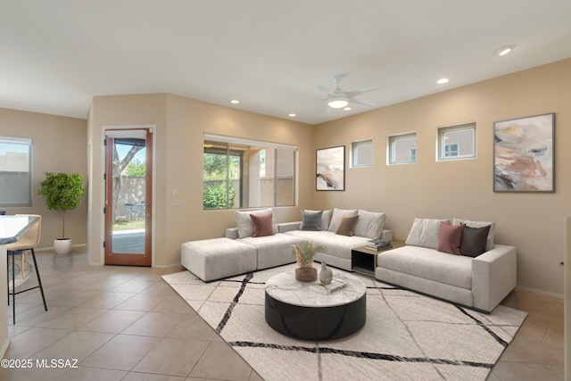 6321 N Via Lomas De Paloma, Tucson, AZ 85718 - living room with light tile patterned floors, plenty of natural light, ceiling fan, recessed lighting, and baseboards