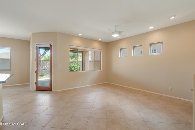 6321 N Via Lomas De Paloma, Tucson, AZ 85718 - empty room featuring a ceiling fan, baseboards, light tile patterned floors, and recessed lighting