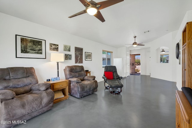 10140 E Pleasant View Way, Tucson, AZ 85748 - living area with ceiling fan and concrete flooring