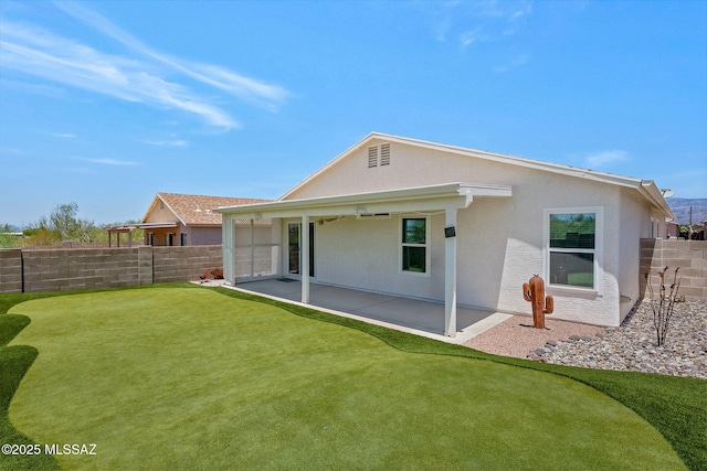 10140 E Pleasant View Way, Tucson, AZ 85748 - rear view of house with a patio area, stucco siding, and a fenced backyard