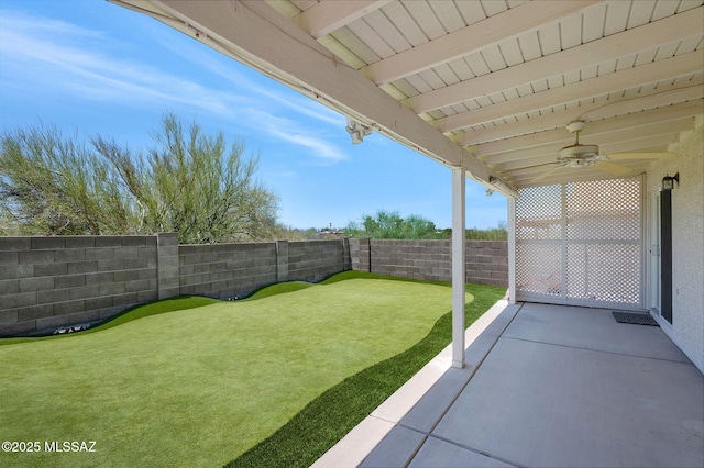 10140 E Pleasant View Way, Tucson, AZ 85748 - fenced backyard featuring a ceiling fan and a patio