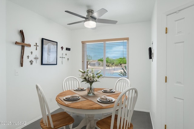 10140 E Pleasant View Way, Tucson, AZ 85748 - dining area featuring baseboards and a ceiling fan