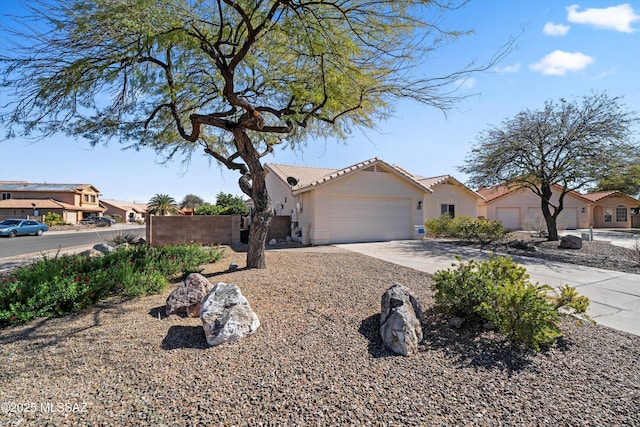 9586 E Paseo, San Bernardo, Tucson, AZ 85747 - view of front of property with stucco siding, an attached garage, driveway, a tile roof, and a residential view