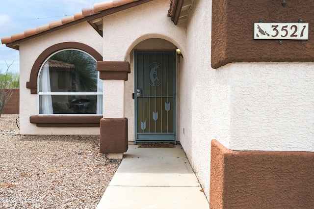 3521 W Camino De Talia, Tucson, AZ 85741 - view of exterior entry featuring stucco siding