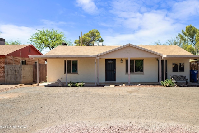 908 E Weymouth St, Tucson, AZ 85719 - single story home featuring a porch and stucco siding