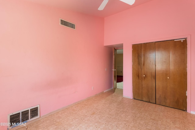 908 E Weymouth St, Tucson, AZ 85719 - unfurnished bedroom with tile patterned floors, a closet, ceiling fan, and baseboards