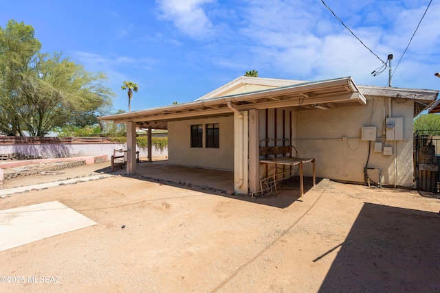 908 E Weymouth St, Tucson, AZ 85719 - rear view of house with a patio area and stucco siding