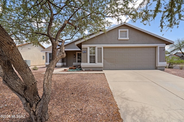 9510 E Danforth Pl, Tucson, AZ 85747 - ranch-style home with driveway, stucco siding, a garage, and central AC unit