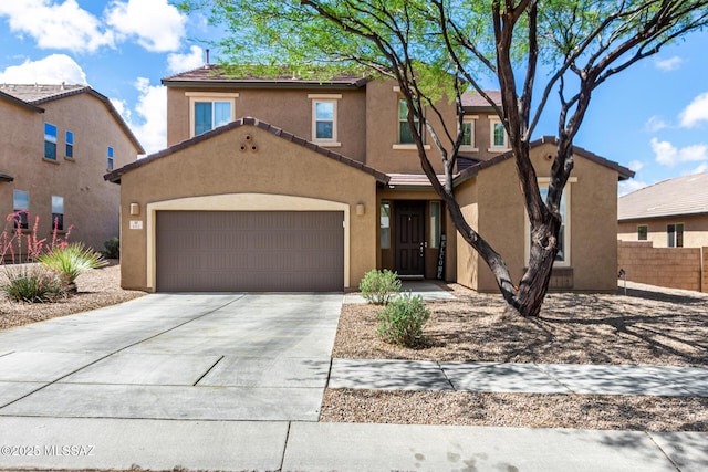 102 E Forrest Feezor St, Vail, AZ 85641 - view of front of house featuring stucco siding, concrete driveway, and a garage