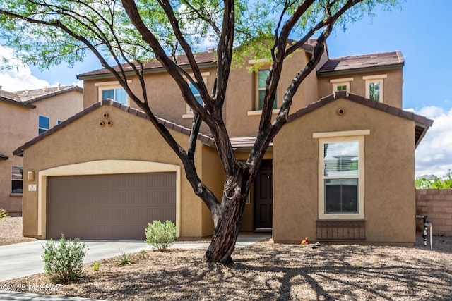 102 E Forrest Feezor St, Vail, AZ 85641 - mediterranean / spanish-style home featuring driveway, an attached garage, and stucco siding