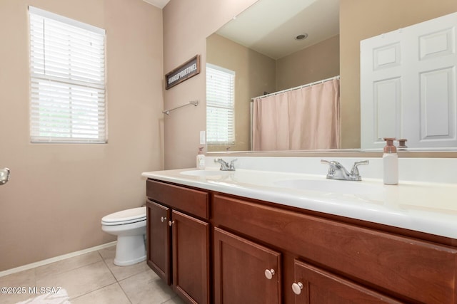 102 E Forrest Feezor St, Vail, AZ 85641 - bathroom featuring toilet, plenty of natural light, double vanity, and tile patterned floors