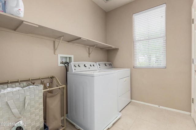 102 E Forrest Feezor St, Vail, AZ 85641 - washroom featuring separate washer and dryer, baseboards, and light tile patterned floors