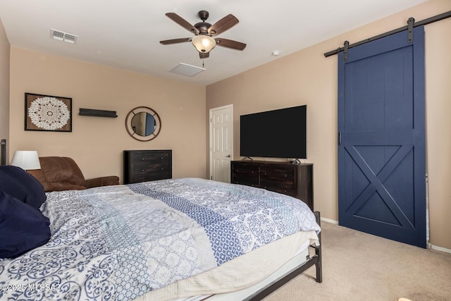 102 E Forrest Feezor St, Vail, AZ 85641 - bedroom with carpet, a barn door, a ceiling fan, and baseboards