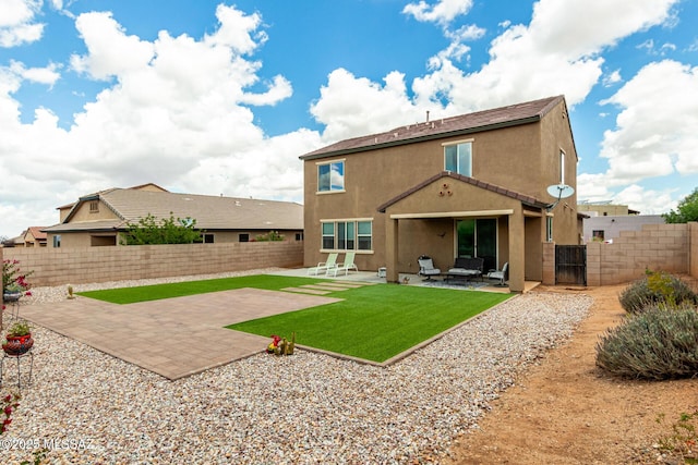 102 E Forrest Feezor St, Vail, AZ 85641 - rear view of house featuring stucco siding and a patio area