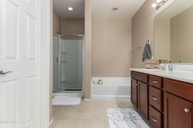102 E Forrest Feezor St, Vail, AZ 85641 - bathroom with tile patterned flooring, vanity, a shower stall, and a garden tub
