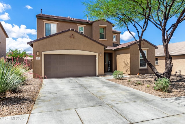 102 E Forrest Feezor St, Vail, AZ 85641 - view of front of property featuring stucco siding, driveway, a garage, and a tiled roof