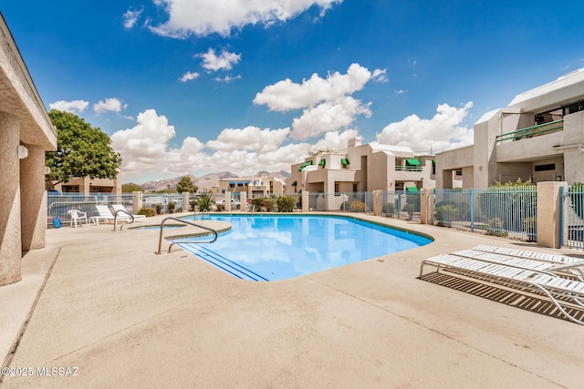 7916 E Colette Cir Unit 51, Tucson, AZ 85710 - community pool featuring a residential view and a patio