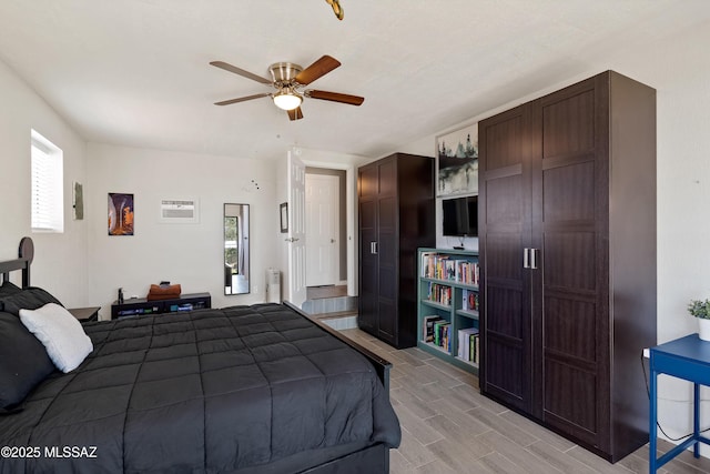 745 N Las Flores Dr, Oracle, AZ 85623 - bedroom with wood finish floors, a ceiling fan, and radiator