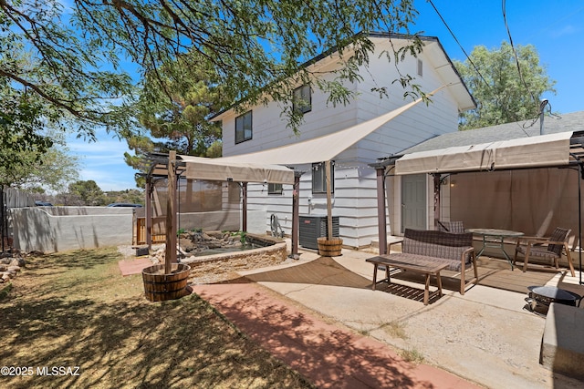 745 N Las Flores Dr, Oracle, AZ 85623 - back of house with a patio area and outdoor dining area
