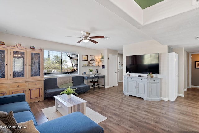 745 N Las Flores Dr, Oracle, AZ 85623 - living area featuring ceiling fan and wood finished floors