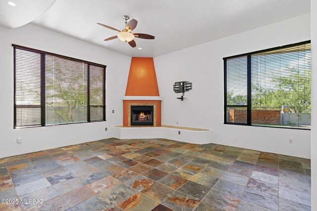 8505 S Circle C Ranch Rd, Vail, AZ 85641 - spare room with stone finish floors, a chandelier, recessed lighting, a towering ceiling, and a tray ceiling