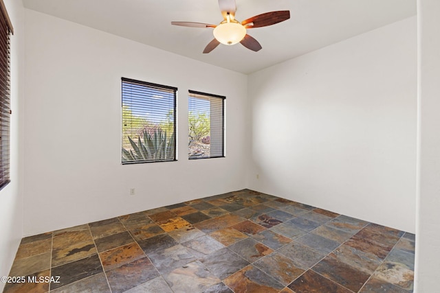 8505 S Circle C Ranch Rd, Vail, AZ 85641 - spare room with stone tile flooring and a ceiling fan