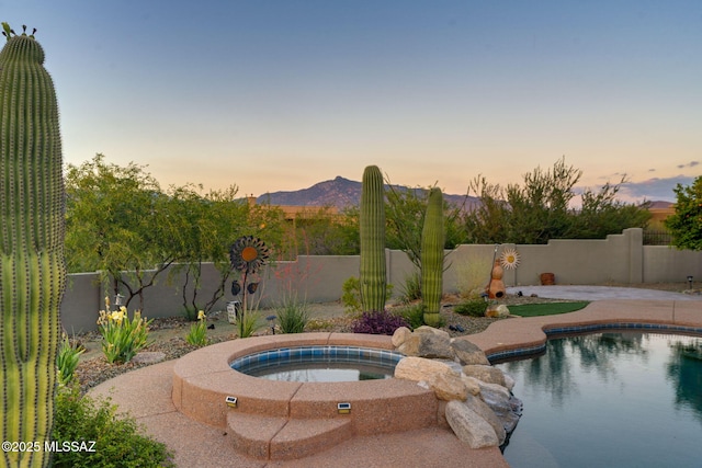 8505 S Circle C Ranch Rd, Vail, AZ 85641 - view of pool featuring a fenced backyard, an in-ground hot tub, and a mountain view