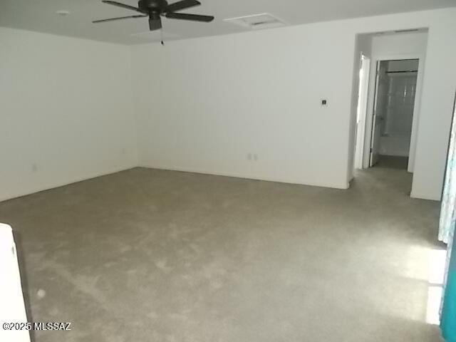 902 W Calle Tipoy, Sahuarita, AZ 85629 - carpeted empty room with a ceiling fan