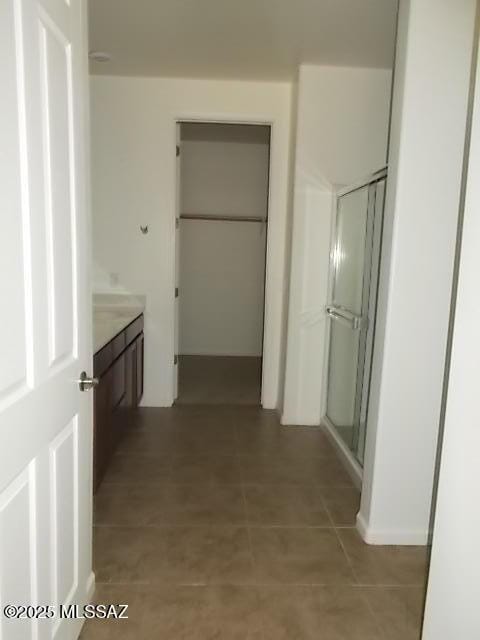 902 W Calle Tipoy, Sahuarita, AZ 85629 - bathroom with vanity and an enclosed shower