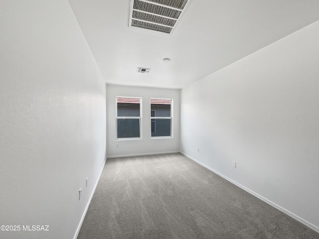 7637 E Cholla Overlook Dr, Tucson, AZ 85710 - carpeted empty room featuring baseboards