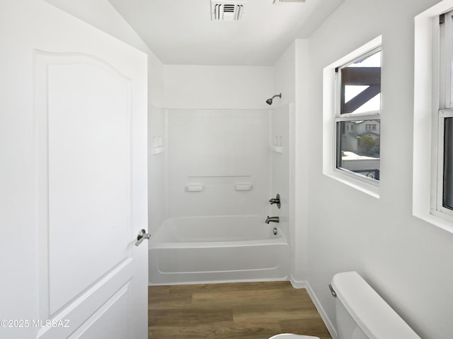 7637 E Cholla Overlook Dr, Tucson, AZ 85710 - full bath with toilet, wood finished floors, and shower / bath combination