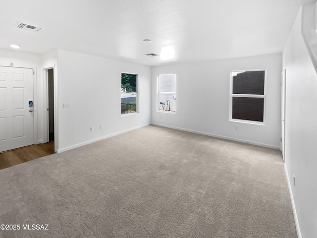 7637 E Cholla Overlook Dr, Tucson, AZ 85710 - empty room featuring carpet flooring and baseboards