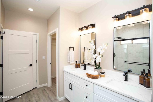 3601 E Nebraska Stra, Tucson, AZ 85706 - full bath with a shower stall, double vanity, wood finished floors, and recessed lighting