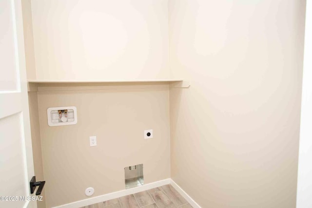 3601 E Nebraska Stra, Tucson, AZ 85706 - laundry room featuring hookup for a washing machine, light wood-style flooring, hookup for an electric dryer, and gas dryer hookup