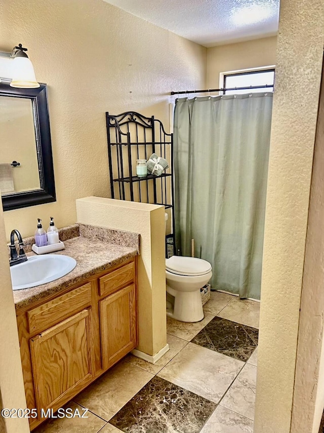 1643 W Houchin Way, Tucson, AZ 85746 - full bath with a textured wall, vanity, a shower with shower curtain, and a textured ceiling