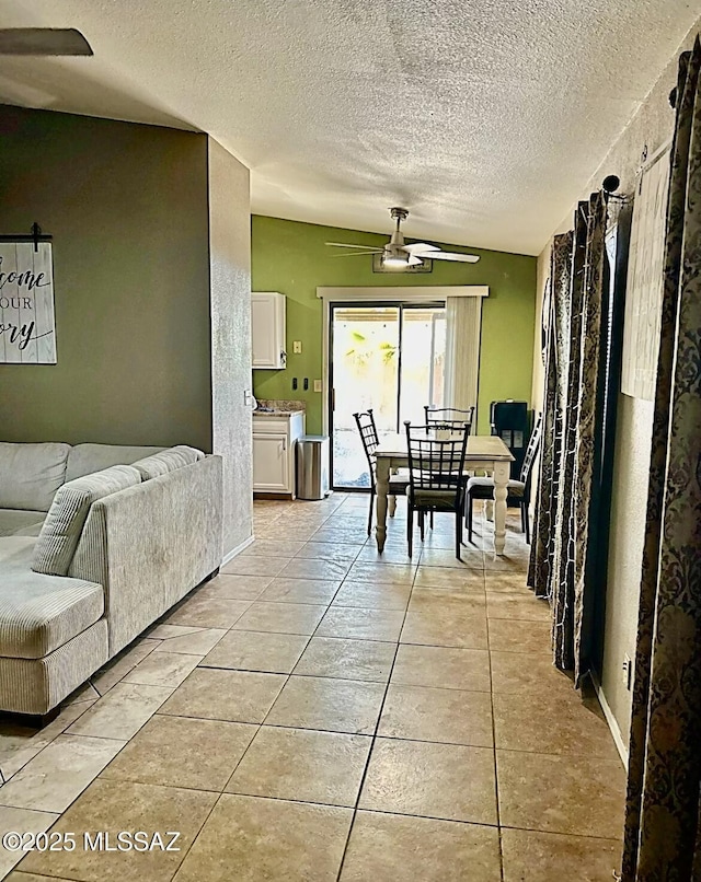 1643 W Houchin Way, Tucson, AZ 85746 - dining room featuring ceiling fan, a textured ceiling, and light tile patterned floors