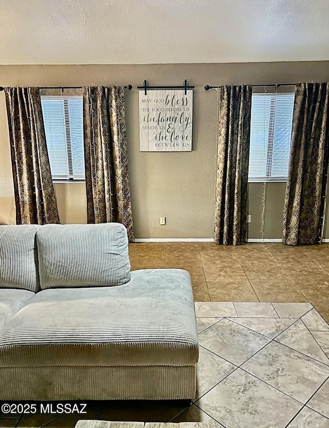 1643 W Houchin Way, Tucson, AZ 85746 - sitting room featuring tile patterned floors, plenty of natural light, and a textured ceiling