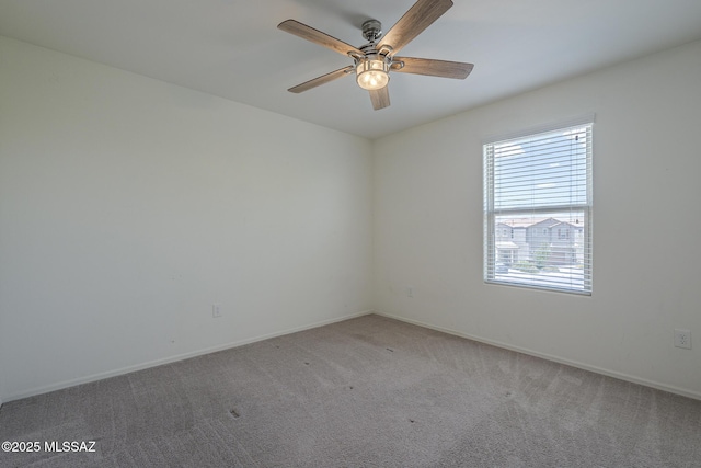 662 N Tree Mist Ln, Sahuarita, AZ 85629 - carpeted spare room with ceiling fan and baseboards