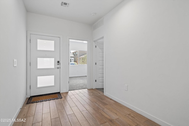 12767 E Giada Dr, Vail, AZ 85641 - entrance foyer featuring light wood-type flooring and baseboards
