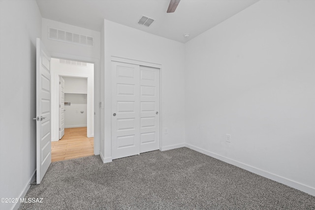 12767 E Giada Dr, Vail, AZ 85641 - unfurnished bedroom with carpet, baseboards, a closet, and ceiling fan