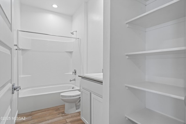 12767 E Giada Dr, Vail, AZ 85641 - full bathroom with toilet, wood finished floors, vanity, shower / bath combination, and recessed lighting