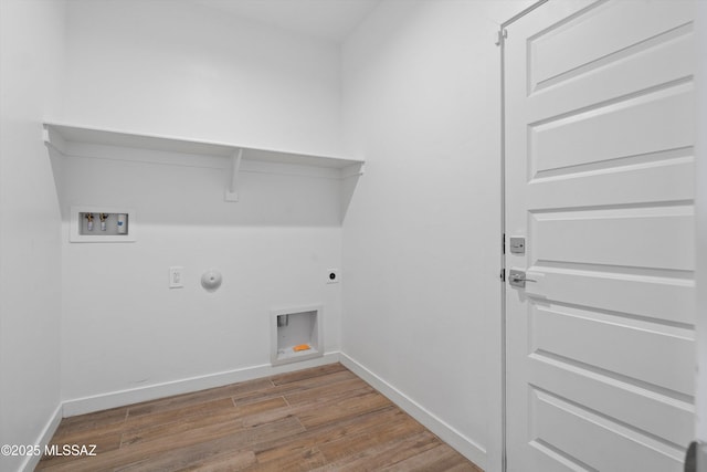 12767 E Giada Dr, Vail, AZ 85641 - laundry area featuring hookup for an electric dryer, hookup for a washing machine, baseboards, wood finished floors, and hookup for a gas dryer